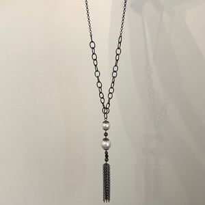 Long chain necklace with imitation pearls and tassel detail